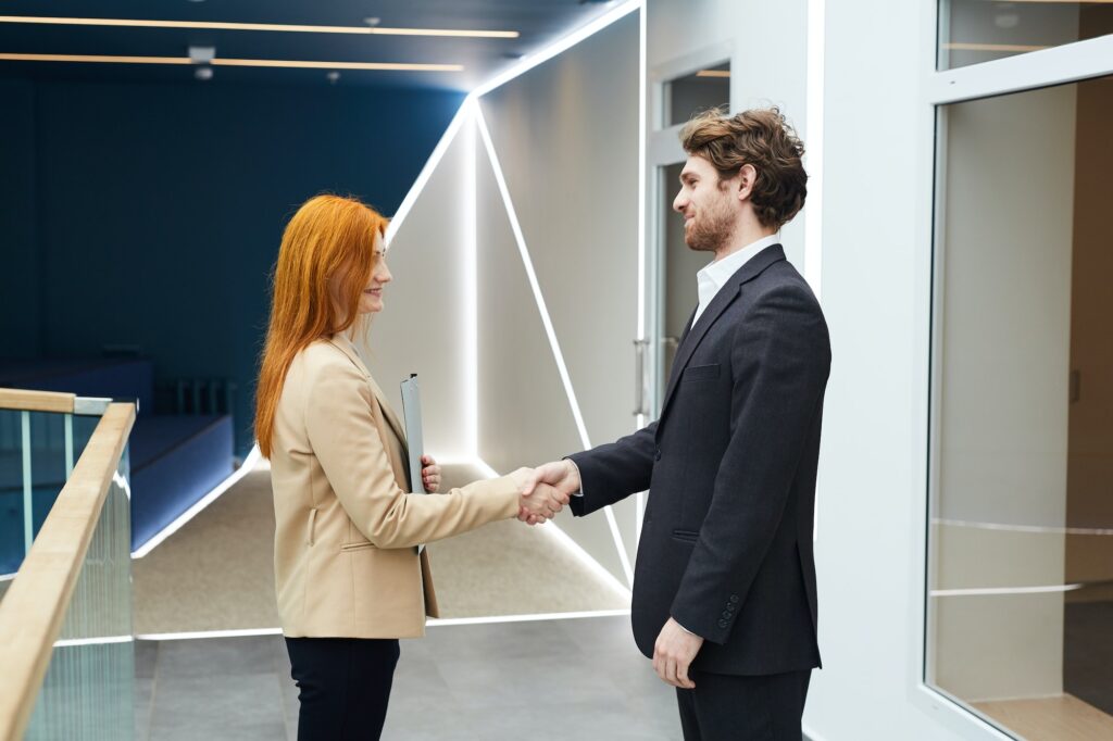 Businessman Shaking Hands with Recruiter
