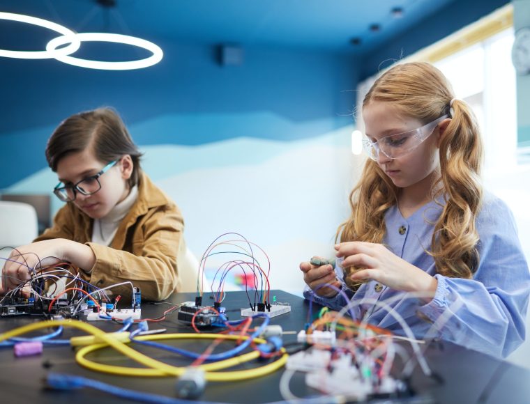 Kids Experimenting in Engineering Class at School